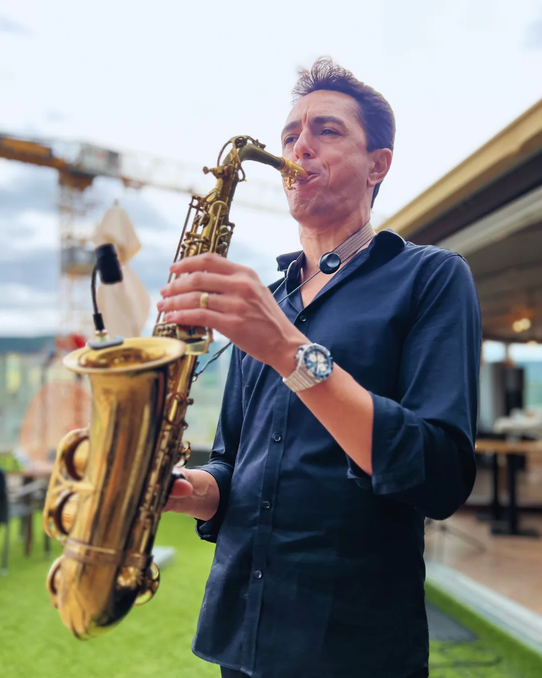 Saxophonist live auf dem Rooftop